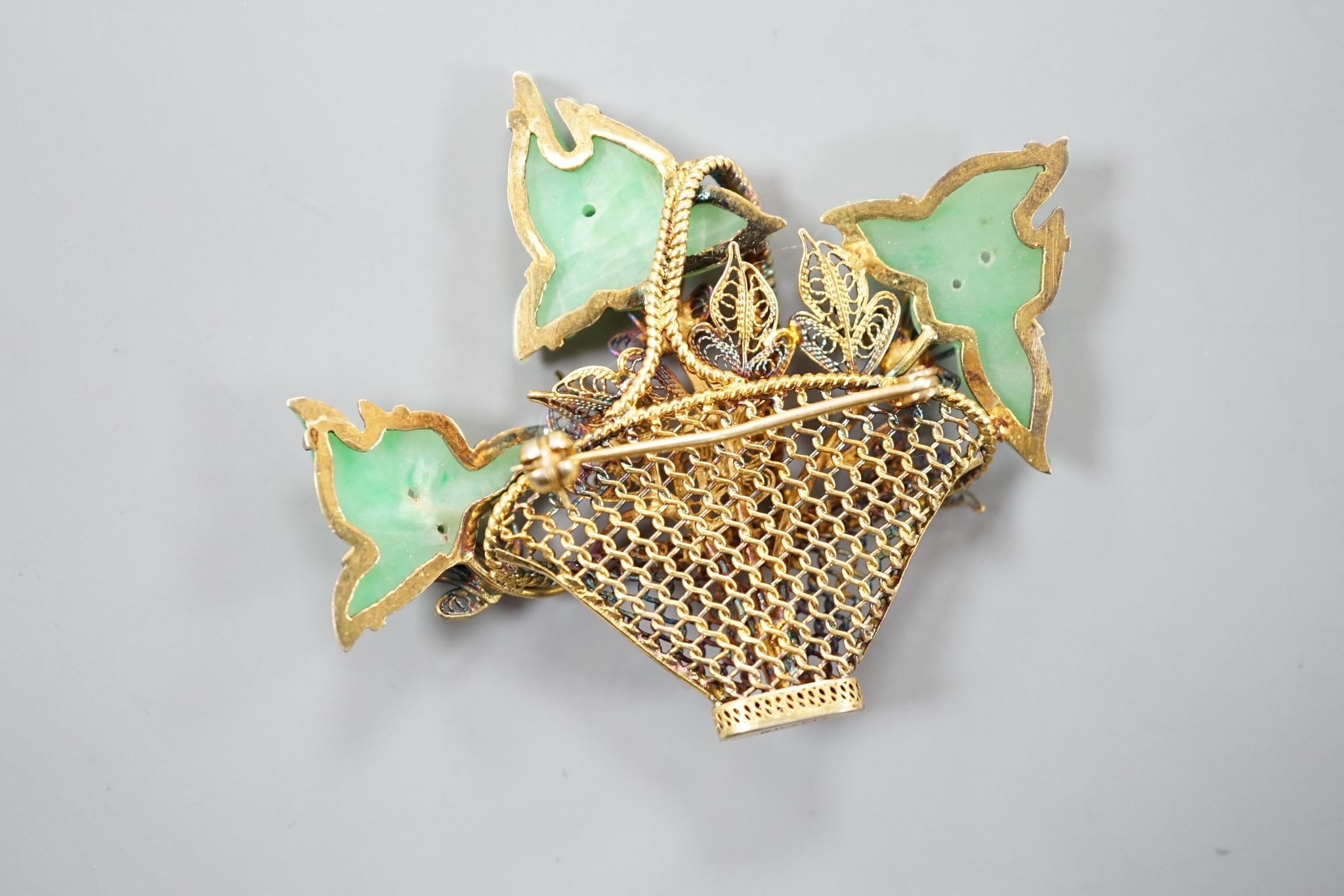 A continental gilt white metal and simulated jade set 'Basket of Flowers, brooch, height 49mm.